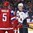 BUFFALO, NEW YORK - JANUARY 2: USA's Brady Tkachuk #7 has words with Russia's Artyom Minulin #5 during quarterfinal round action at the 2018 IIHF World Junior Championship. (Photo by Matt Zambonin/HHOF-IIHF Images)

